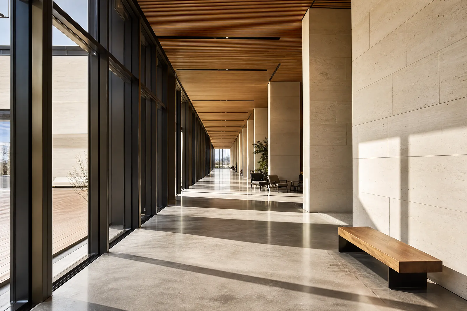 A long modern colonnade with evenly spaced bands of light and shadow.