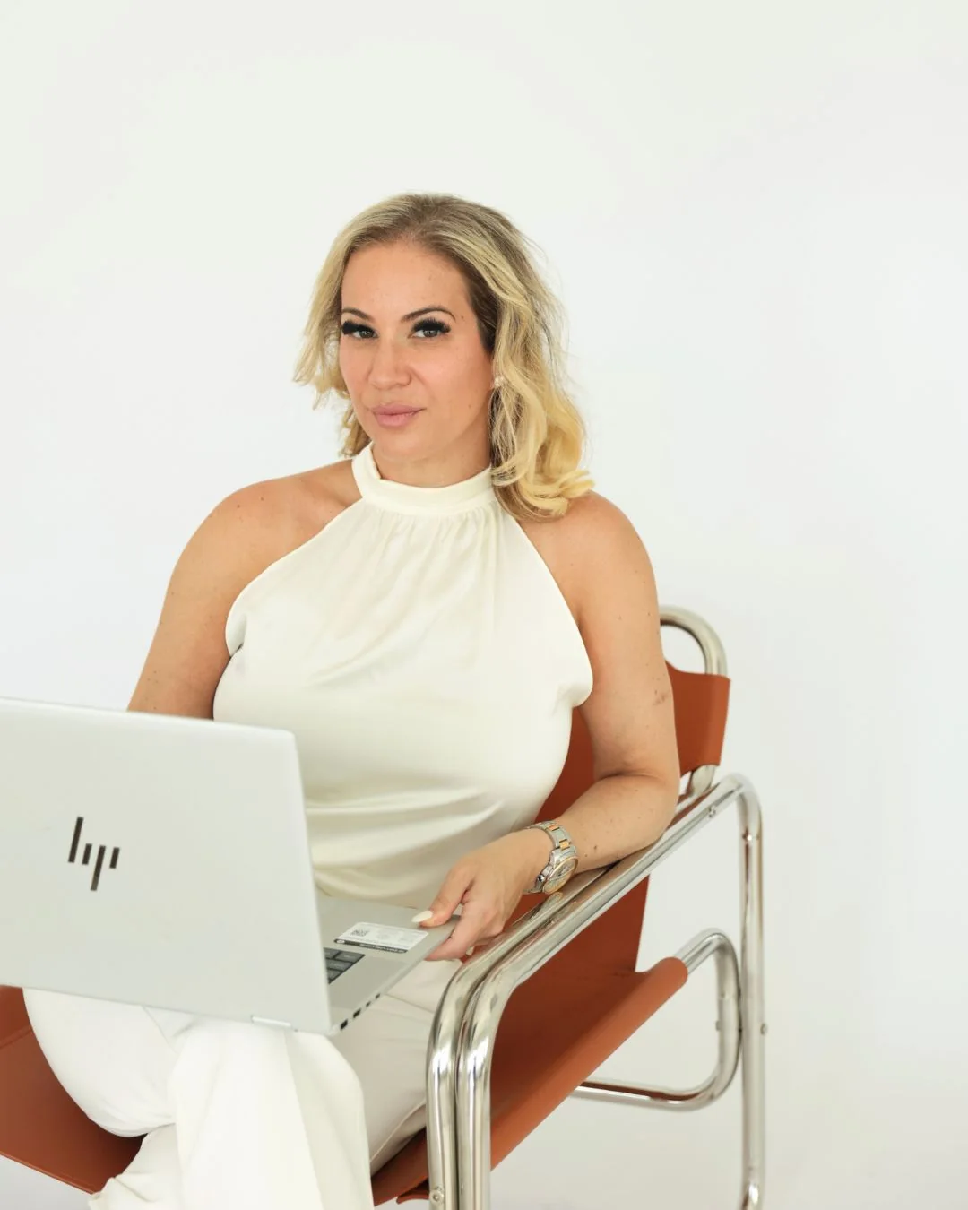 Jessica Cohen, CPA working at a laptop
