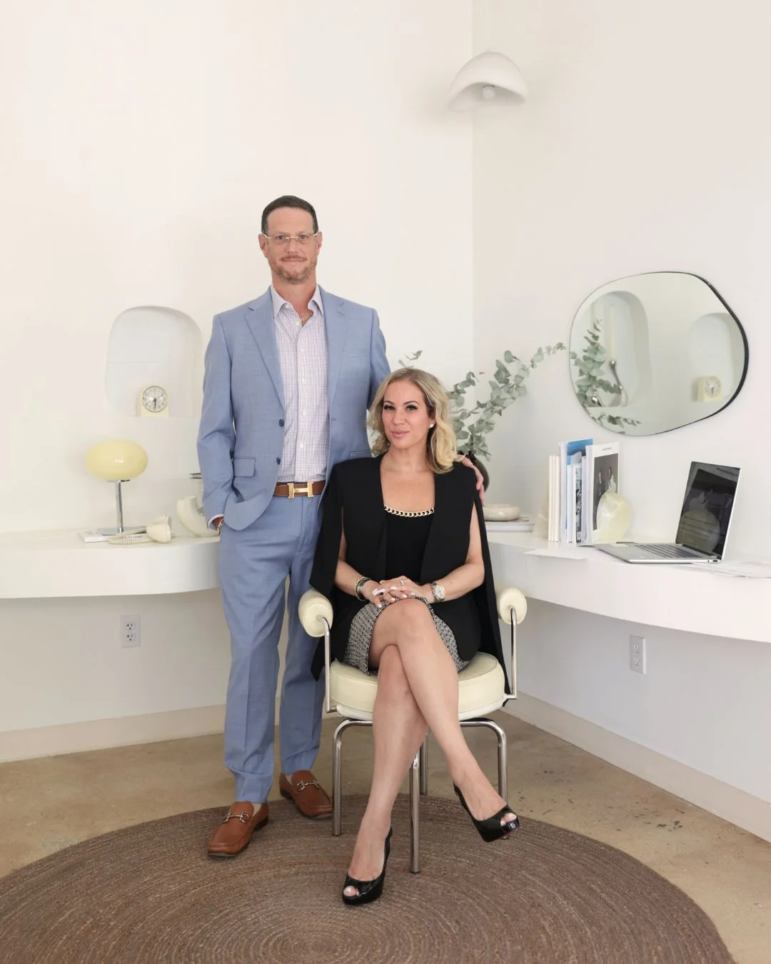 Jessica Cohen, CPA seated with Jason E. Cohen, CPA in the Centsible Solutions office
